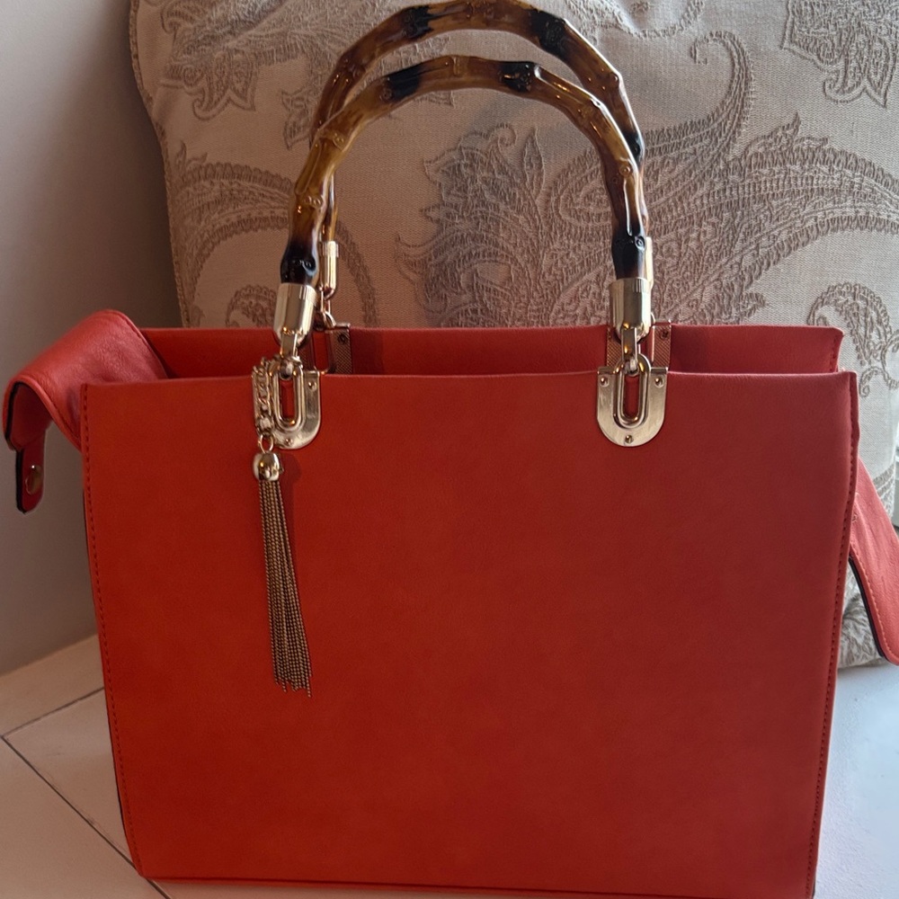 Elegant Orange Handbag with Tortoise Handle